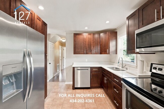 Building Photo - Spacious 4-Bedroom Single Family home with Large Backyard & Ample Storage