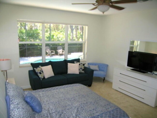 Foto del edificio - Fully Furnished Pool Home PGA Village