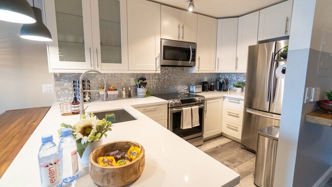 Modern kitchen with new appliances - 750 NE 64th St