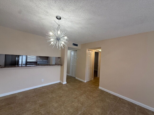 Building Photo - Charming 2-Bed Water View Condo Haven in M...