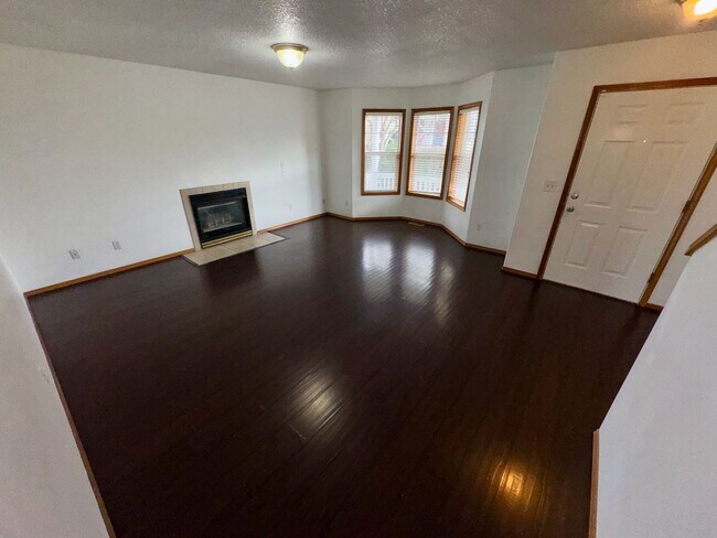 Building Photo - Spacious 4BR Home with Fenced Yard, 2-Car Garage & Convenient Location