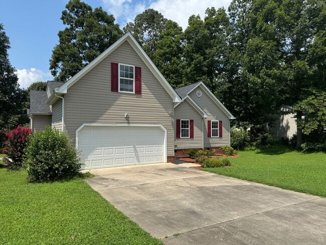 Building Photo - Location! 4 bedroom with garage convenient...