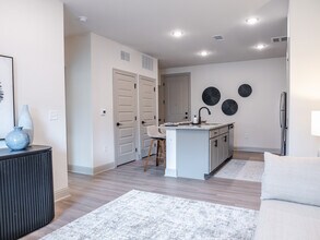 The Perdido: 1BR, 1BA- Living Room - The Flats at Ransley