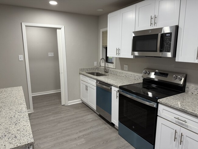 Completely remodeled kitchen with new appliances. - 8274 Lifford Pl