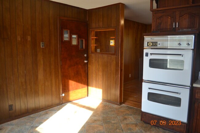 Entry to garage, basement. - 15314 Fuller Ave