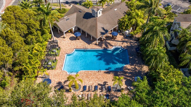 Escape the Florida heat at our resort-style pool, complete with comfortable lounge seating and tropical surroundings. Lounge in style and soak up the Florida sunshine at Meadow Lakes. - Meadow Lakes