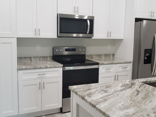 Building Photo - 3 br, 2 bath House - 1401 Capricorn Blvd