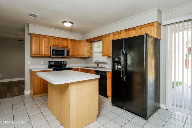 Building Photo - 7930 Rondeau Dr E
