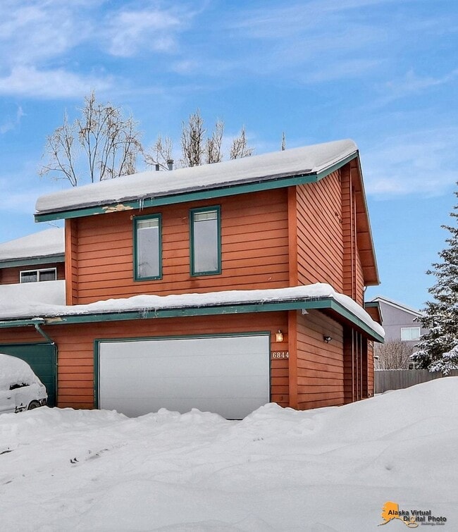 Building Photo - Spacious East Anchorage Home with Yard & Garage!