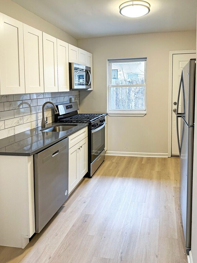 Primary Photo - Modern Charm: Newly Renovated Three-Bedroo...