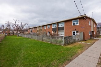 Building Photo - 2029-2055 Victoria Park Ave