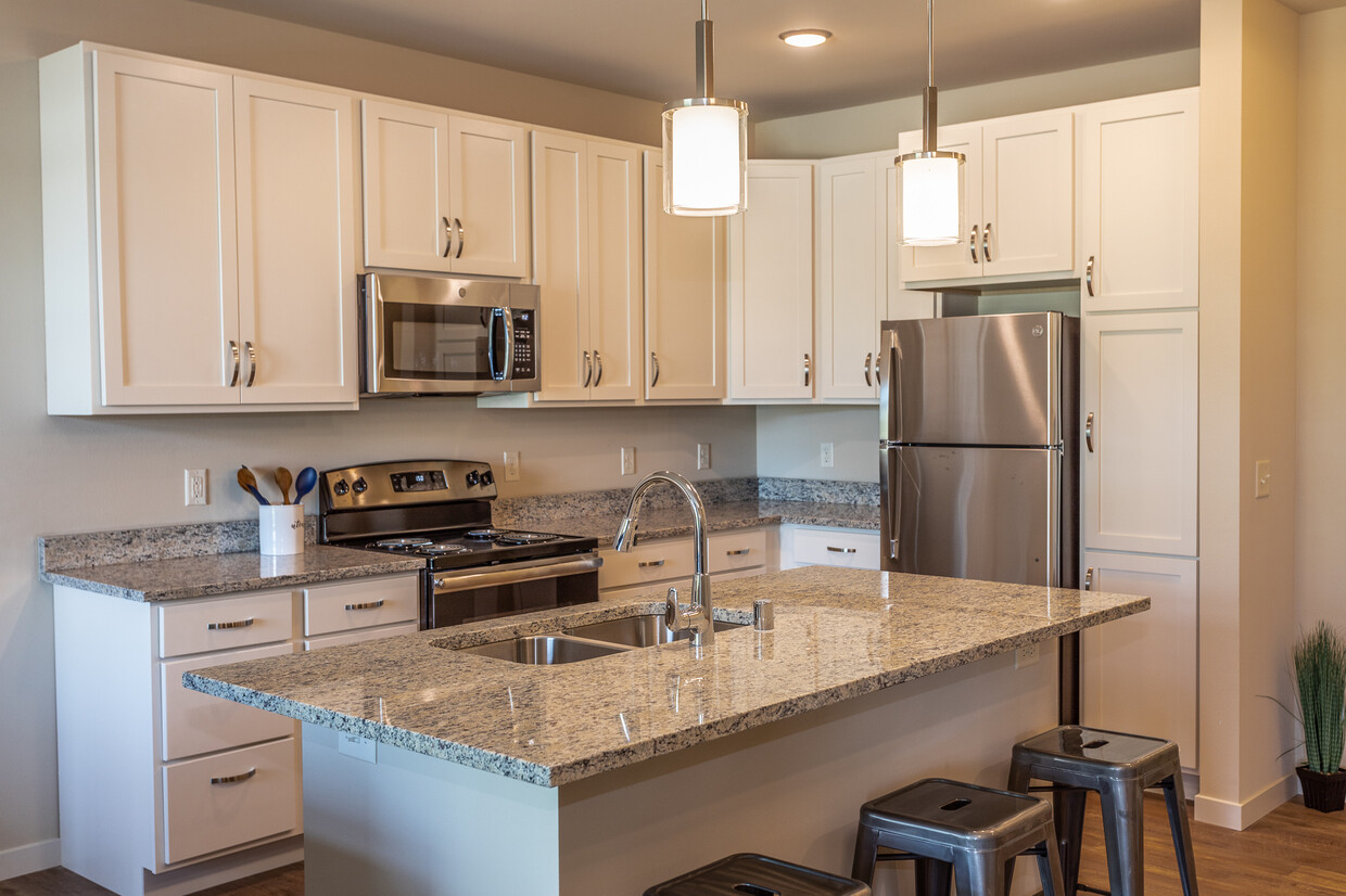 Gorgeous Granite Counter Tops & Kitchen Island with White Cabinets - Lincoln Street Verona, LLC.