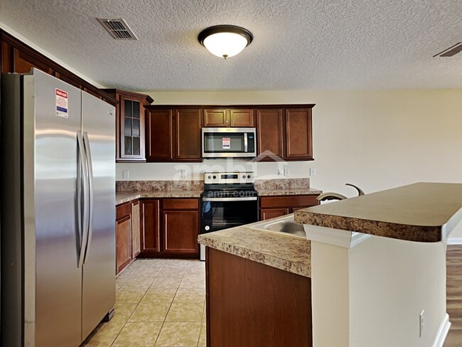 Building Photo - 7344 Rapid River Dr E