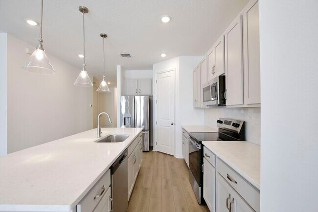 Foto del edificio - Stylish Sunbrooke Sanctuary! Modern 4/2 Home with High Ceilings, Designer Kitchen & Resort Amenities