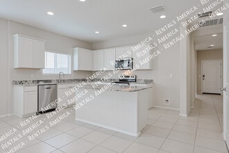 Building Photo - 10338 W Wier Ave