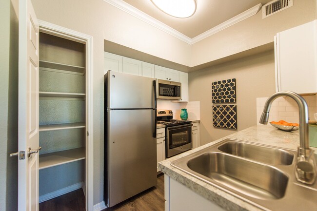 Kitchen and Pantry View - The Meadows at North Richland Hills Apartm...