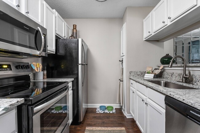 Spacious Kitchen View - Arbors River Oaks Apartments