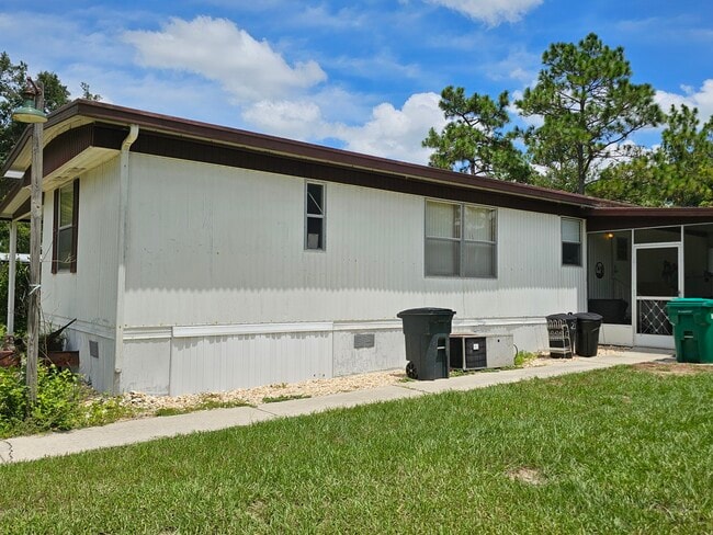 Building Photo - 7096 W Jackson Ln