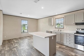 Building Photo - 6680 Hidden Oaks Dr