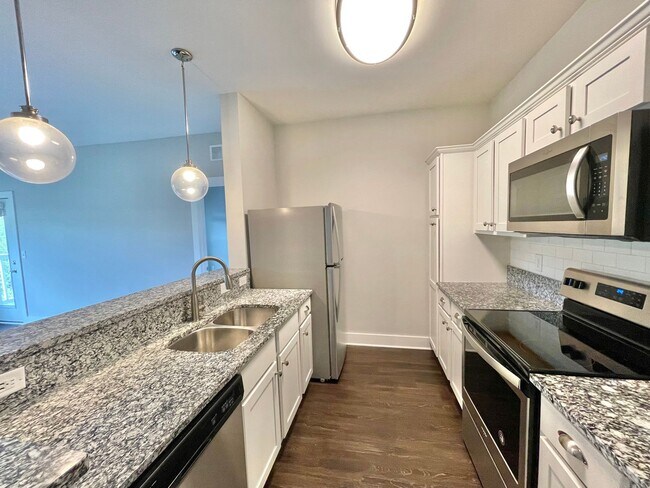 Building Photo - Beautiful Condo! Views & Nature from Every Window! Pet Friendly! Required Insurance & Air Filters...