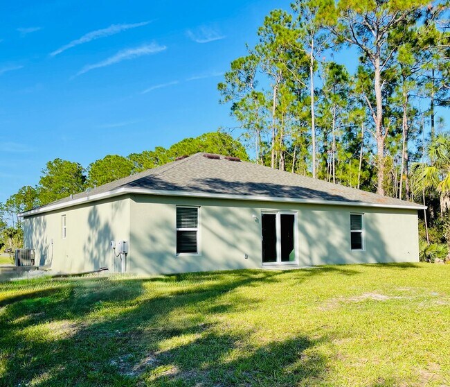 Building Photo - $1,000 Move-In Credit | New Construction 4-Bed Palm Bay Home