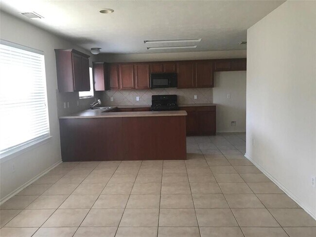 Foto del edificio - 6406 Bonnie Chase Ln