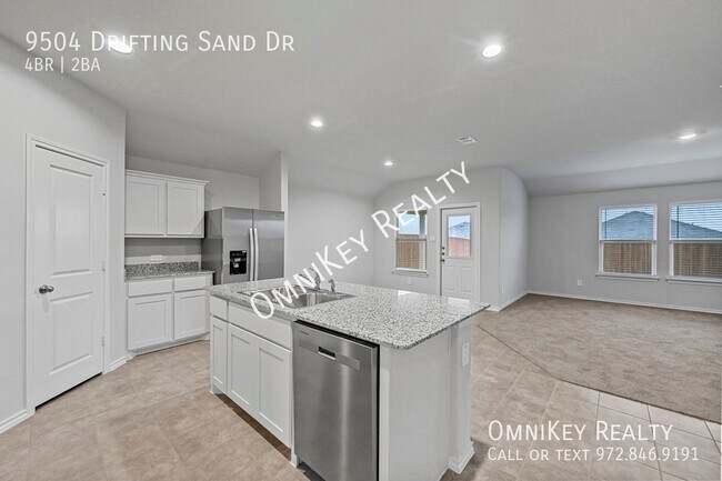 Foto del edificio - 9504 Drifting Sand Dr