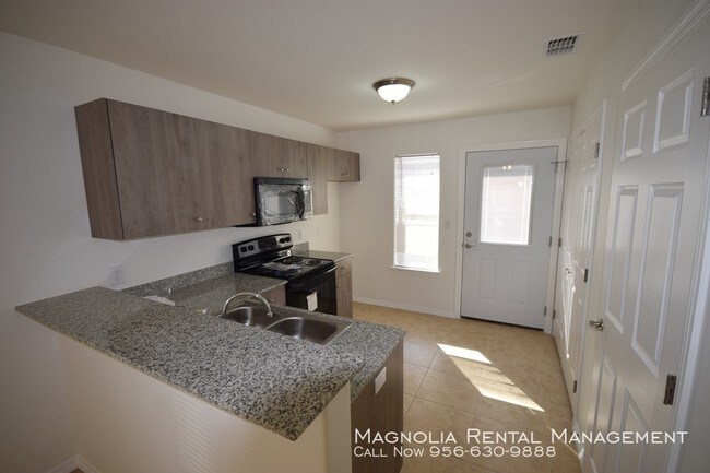 Building Photo - Tulipan Villas Apartments