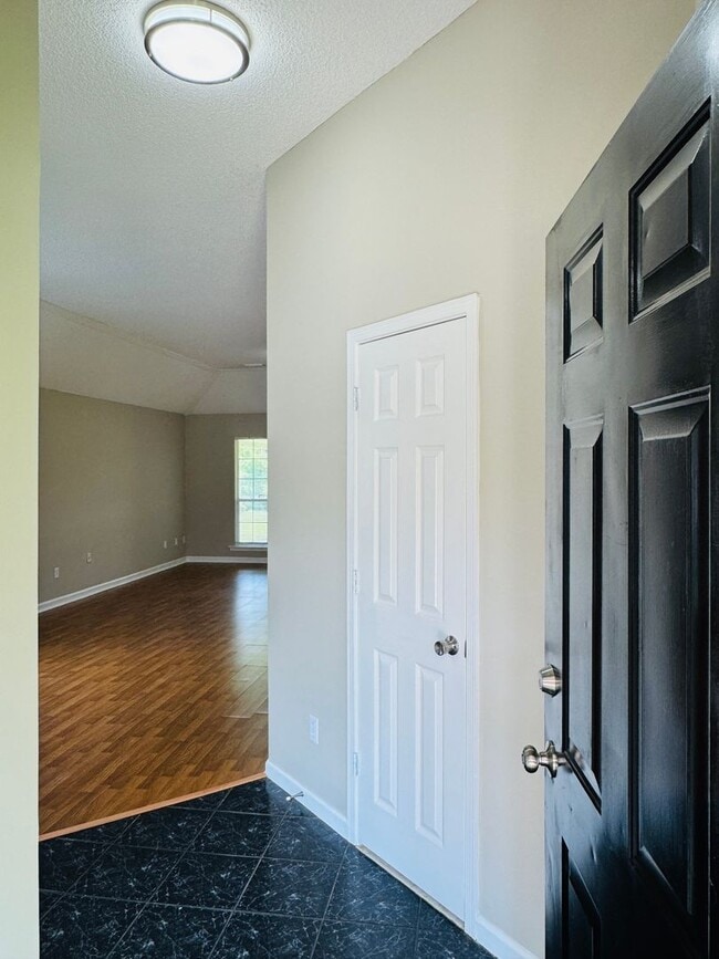 Building Photo - Your new home is just a putt away with thi...