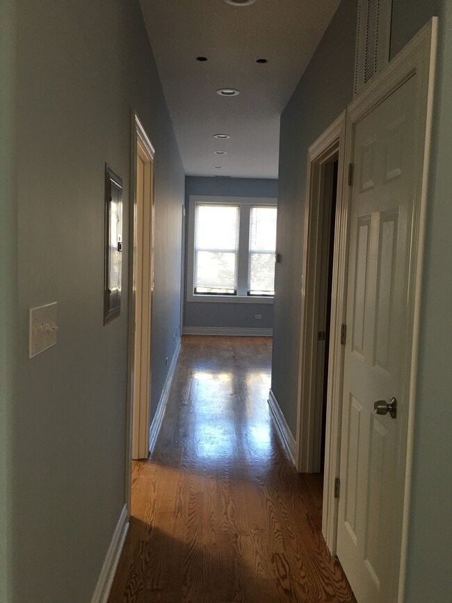 Hallway to bedrooms and living room - 3232 S Morgan St