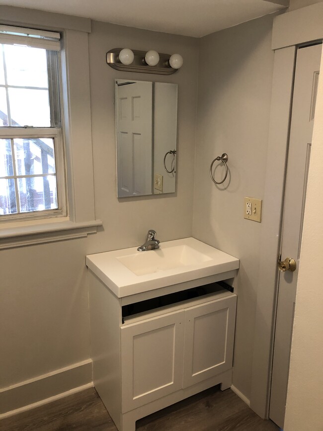 Bathroom. New floor, vanity and medicine cabinet. - 33 Pleasant St