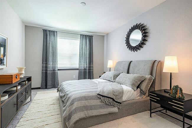 Experience tranquility in this beautifully designed modern bedroom. - Irving Place North Rocky Point