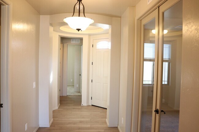 Building Photo - Beautiful four bedroom home with three car...