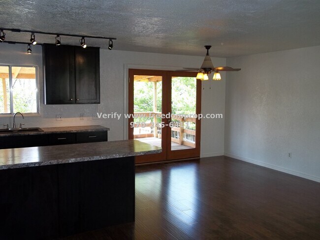 Building Photo - Updated throughout - Large fenced backyard