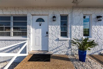 Building Photo - 6020 Midnight Pass Rd