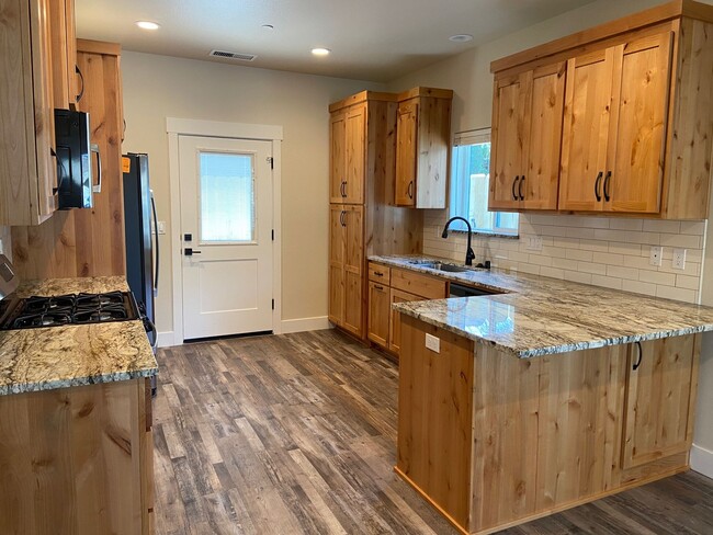 Building Photo - Brand new 2 bedroom house with fenced yard...