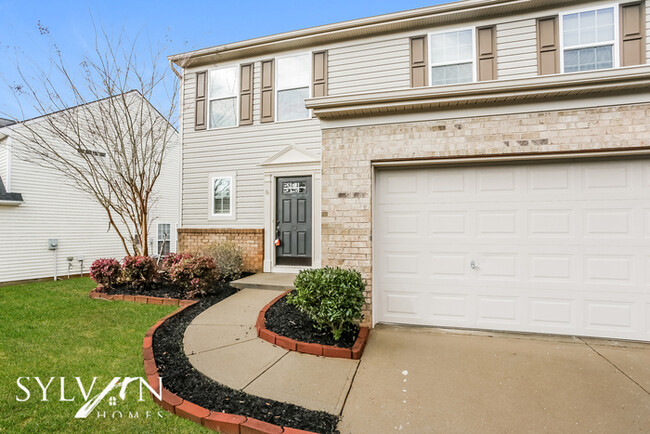 Building Photo - The charming 3-bedroom, 2.5-bathroom home