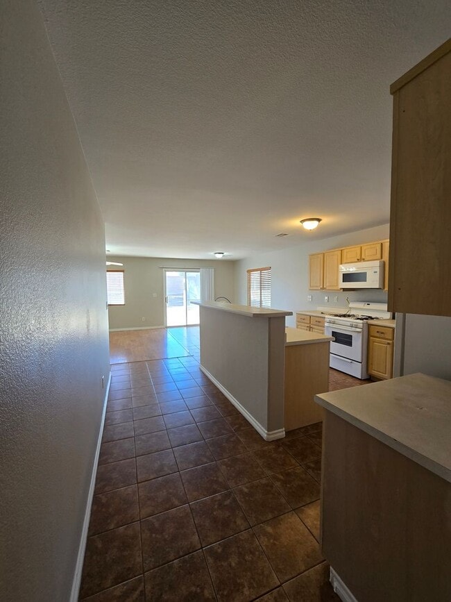 Building Photo - A Fabulous 4 Bedroom Home in N.Las Vegas 1 Bedroom Downstairs.