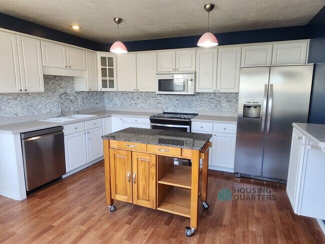 Foto del edificio - Spacious 4-Bedroom Home in Spokane Valley with Finished Basement & Fenced Yard