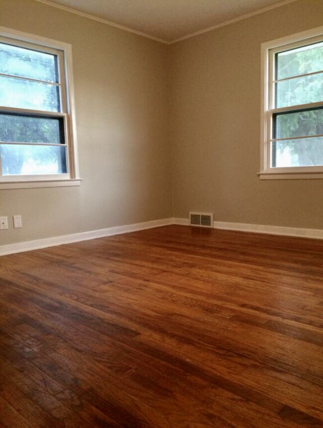 Bedroom - Bedrooms and living room have wood floors - 717 6th St