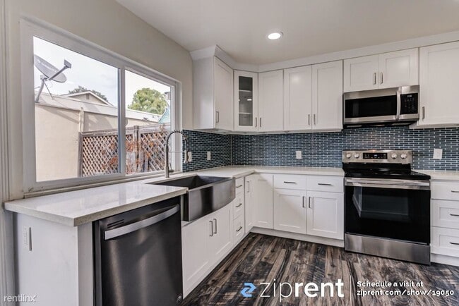 Building Photo - 4 br, 1.5 bath Condo - 201 Carriage Drive,...