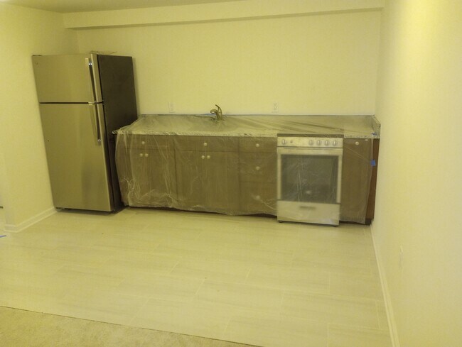 Foto del edificio - 209 E 3rd St