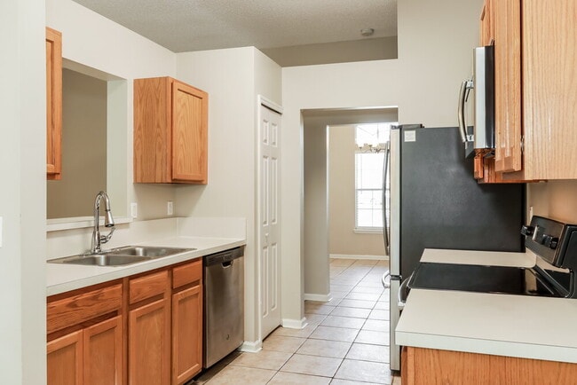 Building Photo - 7811 Invermere Blvd N