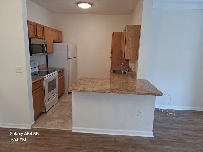 New counter tops and new appliances - 4802 51st St W Apartment