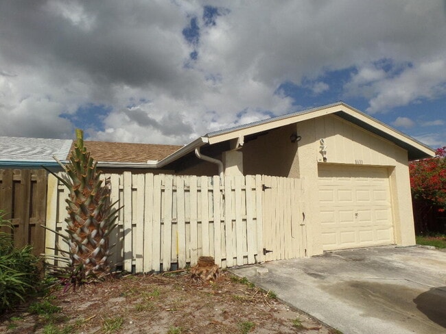 Building Photo - 8633 Pluto Terrace