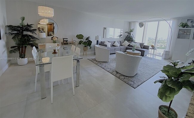 Building Photo - 10275 Collins Ave