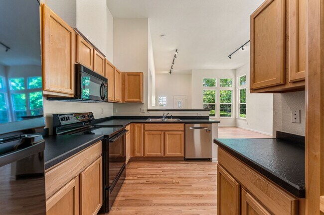Building Photo - Gorgeous Townhome With 2-Car Garage and Ce...