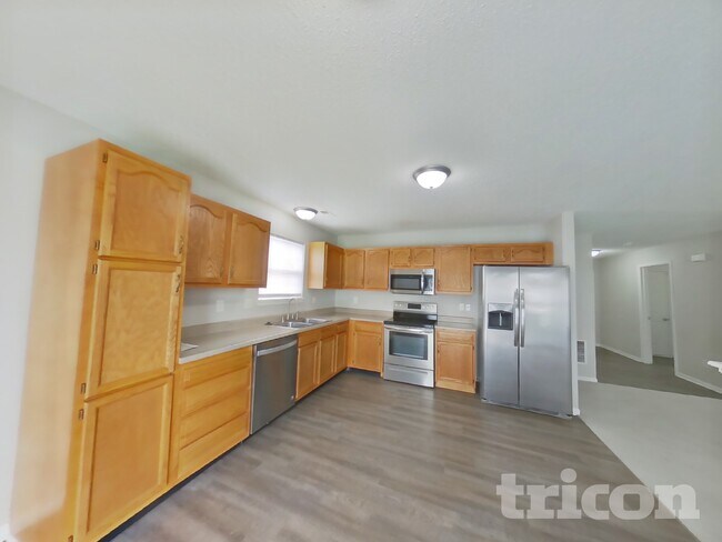 Foto del edificio - 5477 Wood Hollow Dr