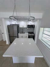 Building Photo - 9064 Collins Ave