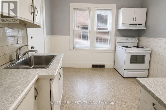 Building Photo - 1264 Elsmere Ave